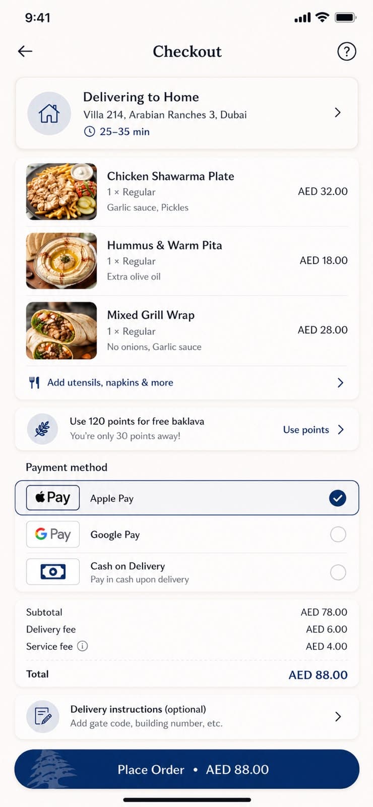 Checkout screen listing three dishes in dirhams, wallet and cash payment options, and an AED 88 order total